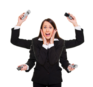 Stressed woman with telephones