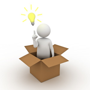 Think out of the box concept, 3d man standing in cardboard box with idea lightbulb on white background